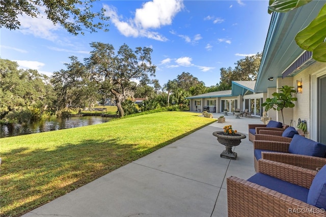 view of patio featuring a water view