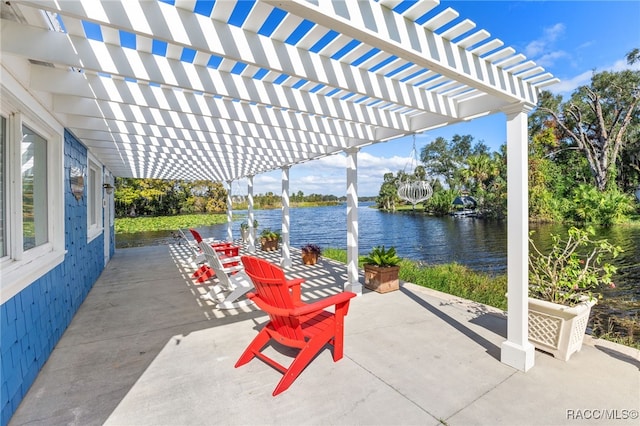 8711 E Cresco Ln, Inverness, FL 34450 - view of patio with a water view and a pergola