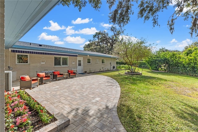 back of property featuring a lawn, a patio area, an outdoor living space, and cooling unit