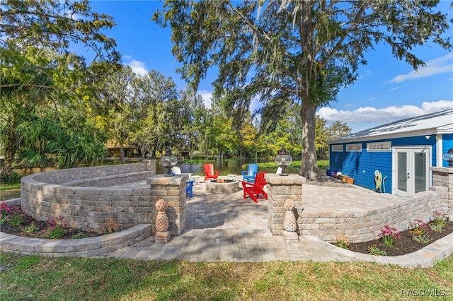 view of yard featuring a patio and a fire pit