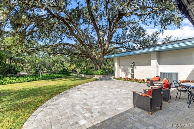 view of patio / terrace with central AC unit