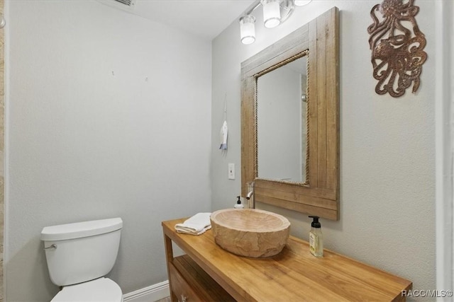 42 Magnolia Ave, Yankeetown, FL 34498 - bathroom featuring toilet and vanity