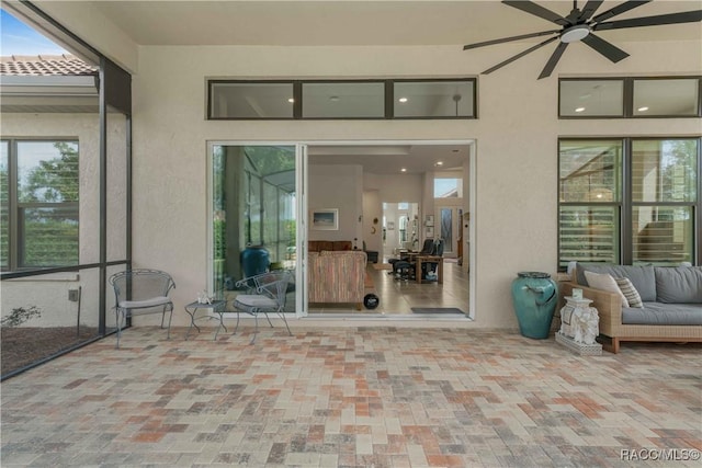 view of patio with ceiling fan