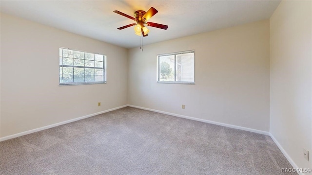 125 W Seymeria Dr, Beverly Hills, FL 34465 - carpeted spare room with healthy amount of natural light and a ceiling fan