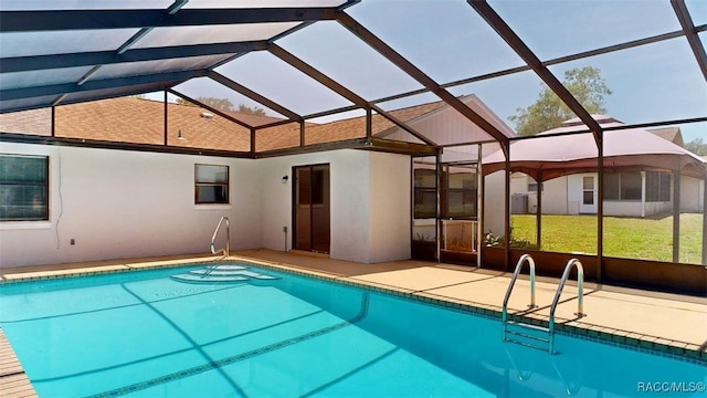 125 W Seymeria Dr, Beverly Hills, FL 34465 - outdoor pool featuring a patio area, a lanai, and a yard