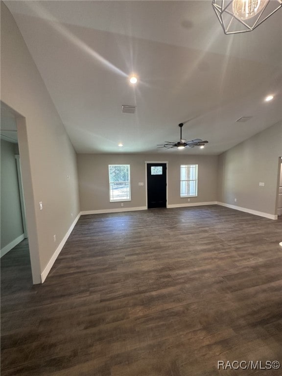 interior space featuring dark hardwood / wood-style flooring, plenty of natural light, and ceiling fan