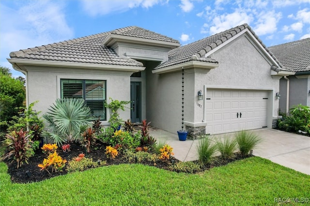 view of front of property featuring a garage