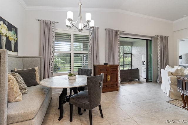 dining room featuring light tile patterned flooring, a chandelier, and ornamental molding