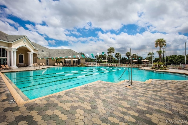 view of pool featuring a patio