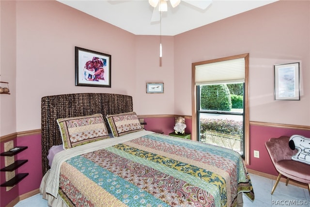 tiled bedroom with ceiling fan