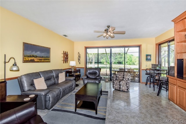 living room featuring ceiling fan