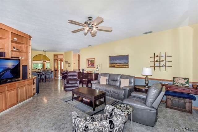 living room with ceiling fan