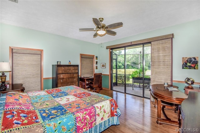 bedroom featuring access to exterior, ceiling fan, and wood-type flooring