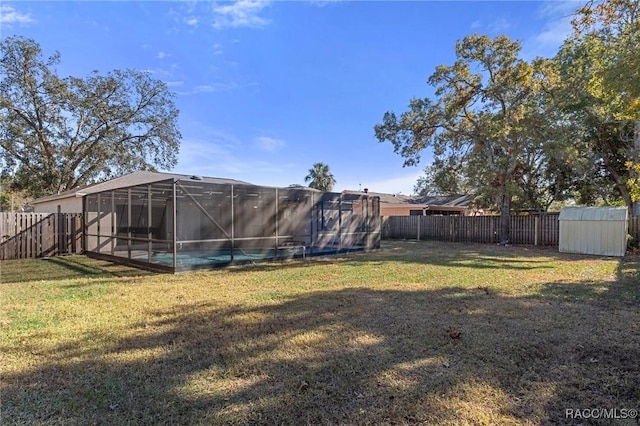 view of yard with a lanai