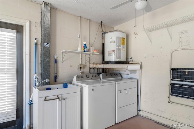 washroom featuring sink, washer and dryer, ceiling fan, a textured ceiling, and water heater