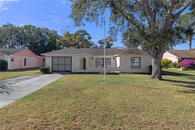 ranch-style house featuring a front lawn