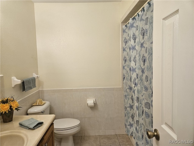 7781 N Lazy Trl, Crystal River, FL 34428 - bathroom with vanity, tile patterned floors, tile walls, toilet, and a shower with shower curtain