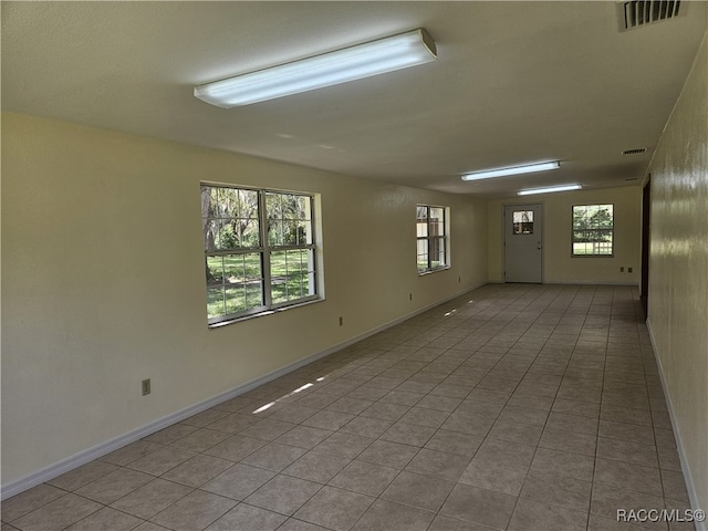 7781 N Lazy Trl, Crystal River, FL 34428 - tiled spare room with baseboards