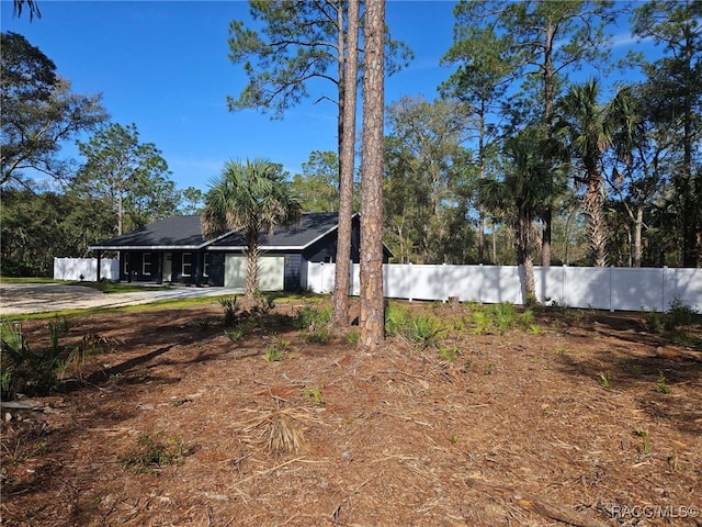 view of front of property with fence