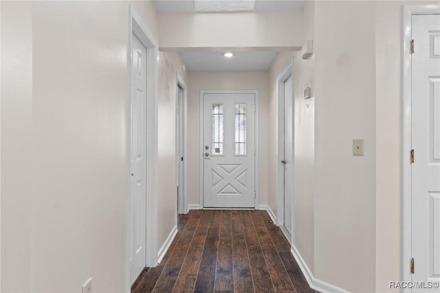 doorway to outside featuring dark hardwood / wood-style flooring