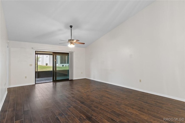 spare room with lofted ceiling, dark hardwood / wood-style floors, and ceiling fan