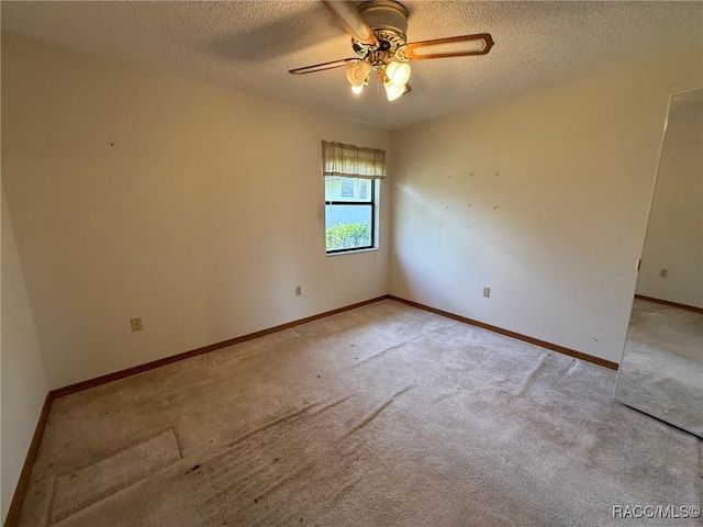 2098 W Deer Trail Ln, Lecanto, FL 34461 - unfurnished room featuring carpet, a textured ceiling, a ceiling fan, and baseboards