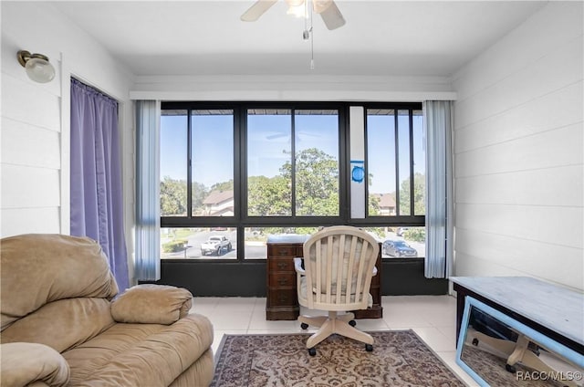 office with light tile patterned floors and a ceiling fan