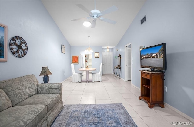 living room with a ceiling fan, visible vents, high vaulted ceiling, and light tile patterned floors