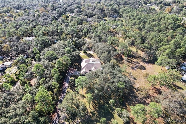 drone / aerial view with a forest view