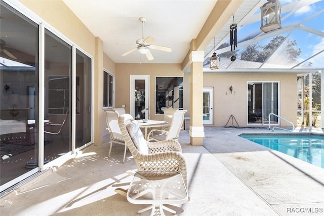 exterior space featuring a lanai, a patio, and ceiling fan