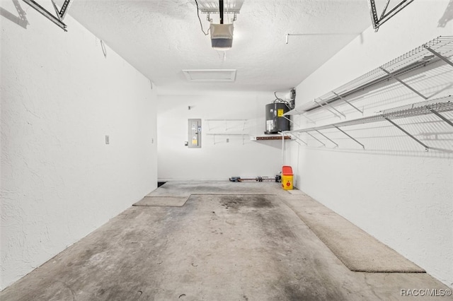 garage with electric panel, a garage door opener, and water heater