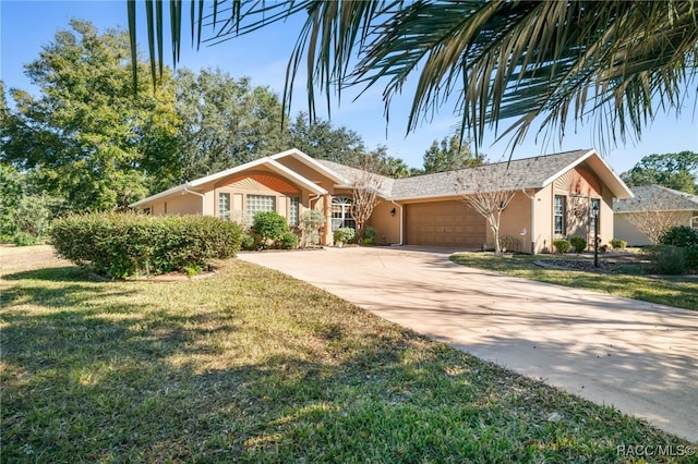 ranch-style home featuring a garage and a front yard