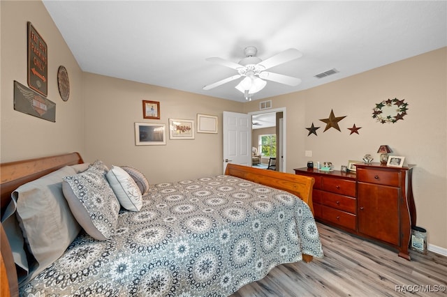 bedroom featuring ceiling fan and light hardwood / wood-style floors