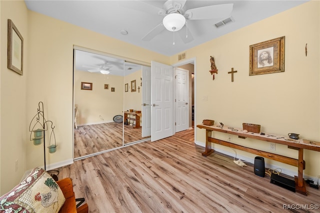 interior space featuring ceiling fan and light hardwood / wood-style flooring