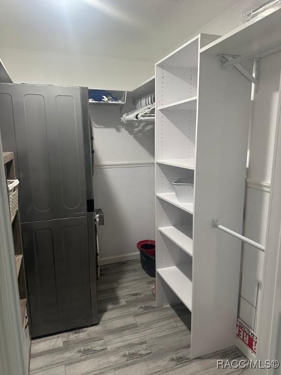 walk in closet featuring light wood-style floors