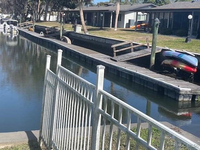 dock area featuring a water view