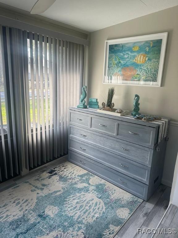 bedroom with wood finished floors