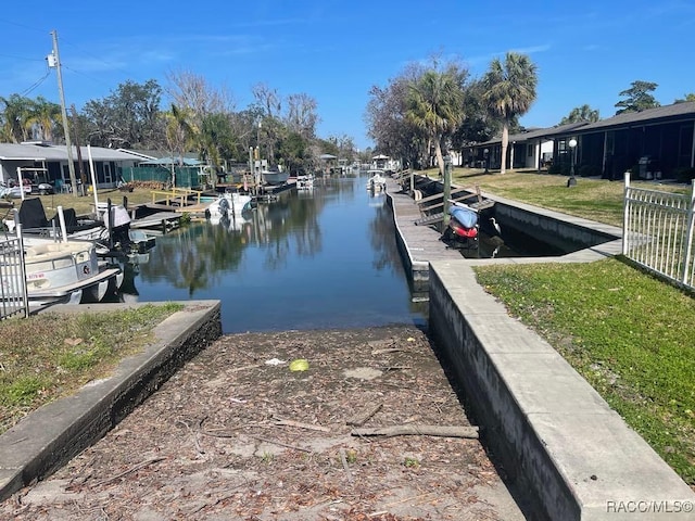 dock area with a water view