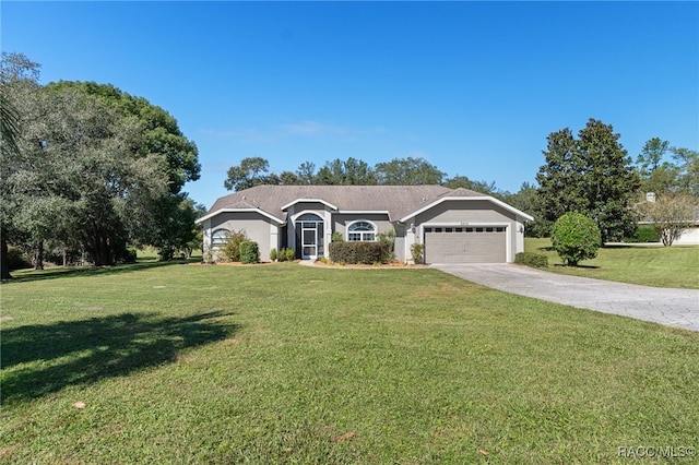 ranch-style house with a garage and a front yard