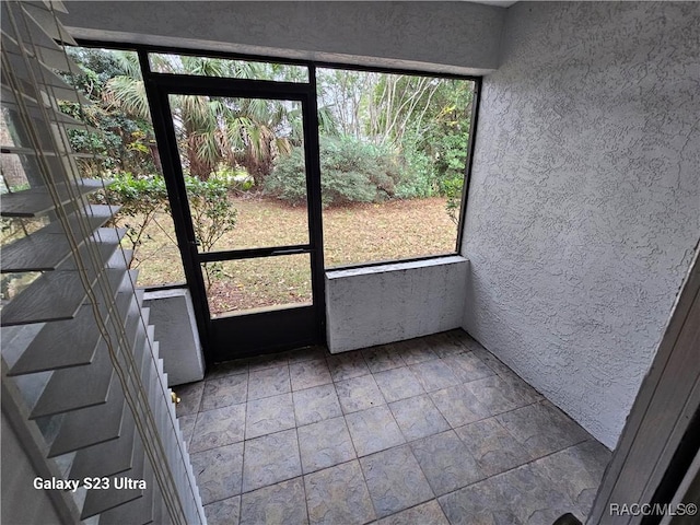 view of unfurnished sunroom