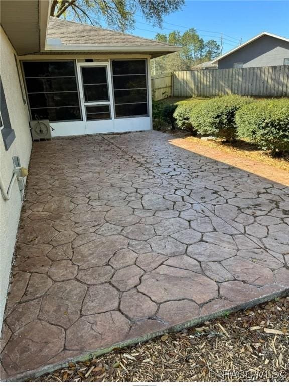 view of patio / terrace with fence