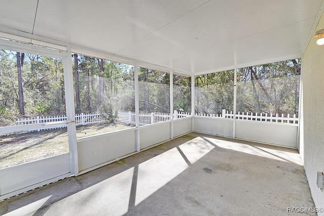 unfurnished sunroom with a wealth of natural light