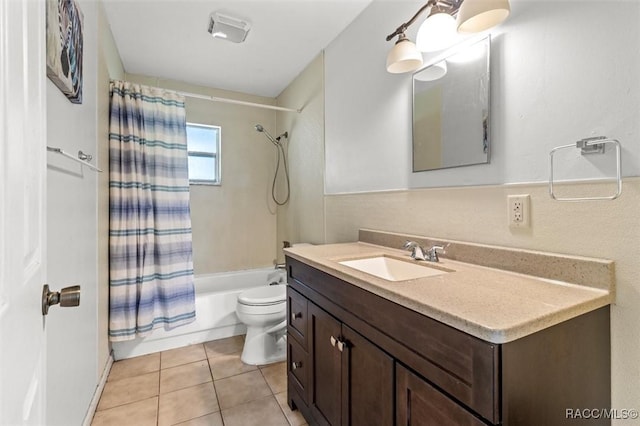 full bathroom featuring toilet, shower / tub combo, tile patterned flooring, and vanity