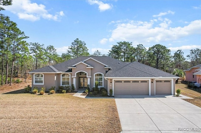 ranch-style home featuring a garage