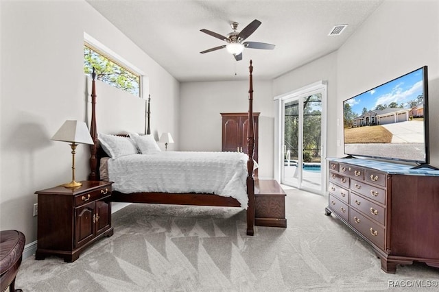 bedroom with light carpet, access to outside, and ceiling fan