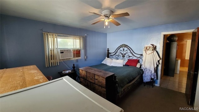 tiled bedroom featuring ceiling fan and cooling unit