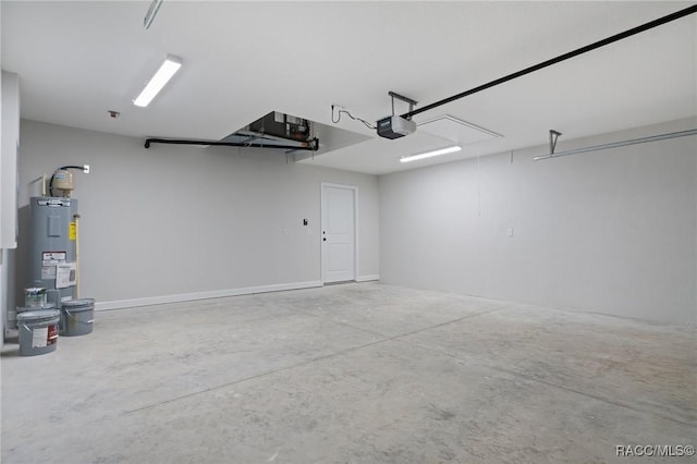 6658 N Bedstrow Blvd, Dunnellon, FL 34434 - garage with a garage door opener and electric water heater