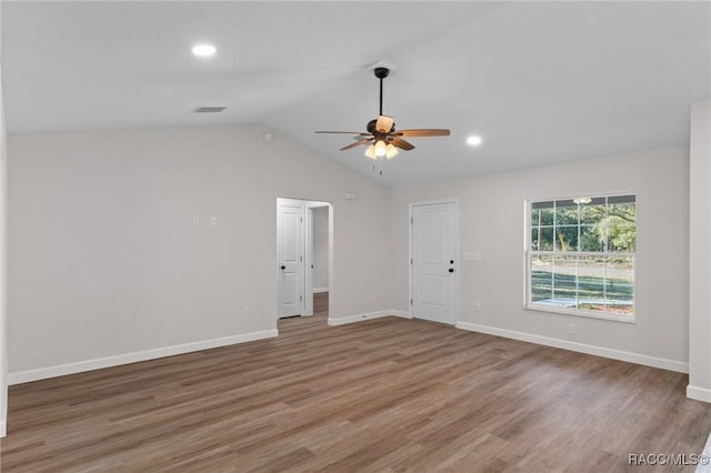 6658 N Bedstrow Blvd, Dunnellon, FL 34434 - unfurnished living room featuring wood finished floors, ceiling fan, lofted ceiling, and recessed lighting