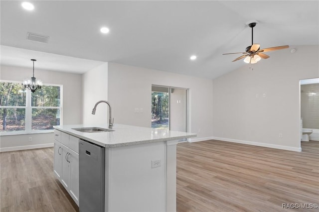 6658 N Bedstrow Blvd, Dunnellon, FL 34434 - kitchen featuring dishwasher, vaulted ceiling, light wood-style flooring, a kitchen island with sink, and ceiling fan