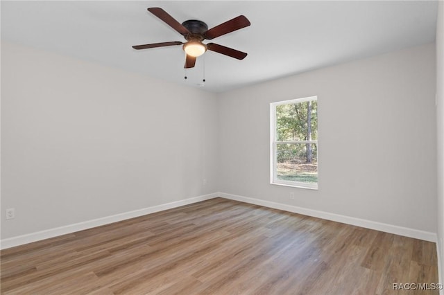 6658 N Bedstrow Blvd, Dunnellon, FL 34434 - spare room featuring light wood-style flooring and ceiling fan